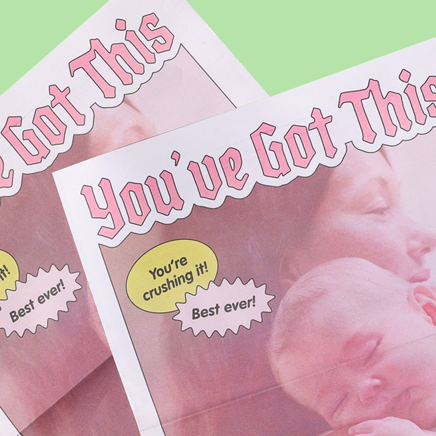 Close-up shot of you've got this newspapers lying on the green color background.